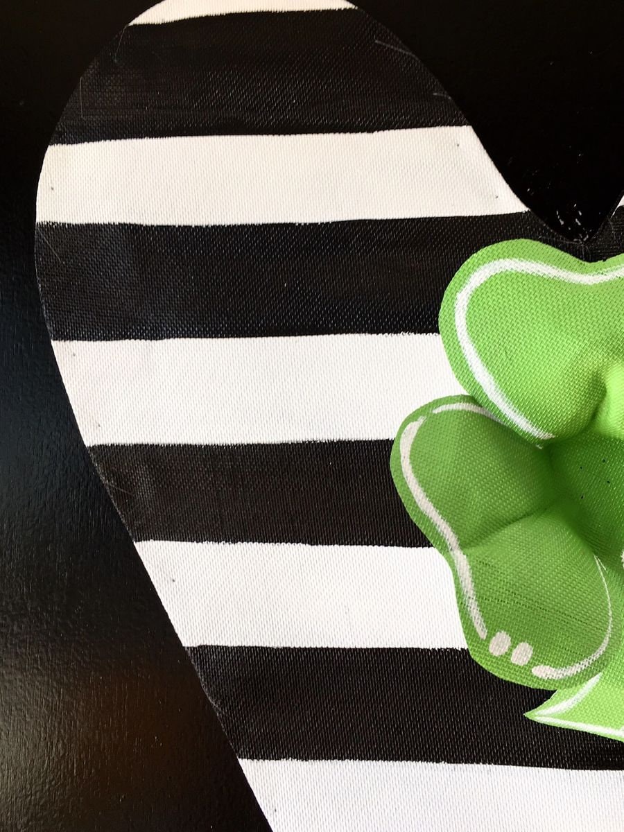 St. Patrick’s Day Black and White striped heart with Four Leaf Clover Center