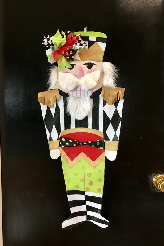 CHRISTMAS DOOR DECOR/ Screen Wire Whimsical,Christmas Door Hanger, Nutcracker with Green Red and Black Bright Ribbon Christmas Wreath